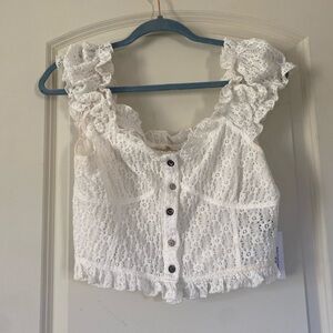 POL eyelet Top size small. New w tags . Bust 16” pit to pit. 15” long